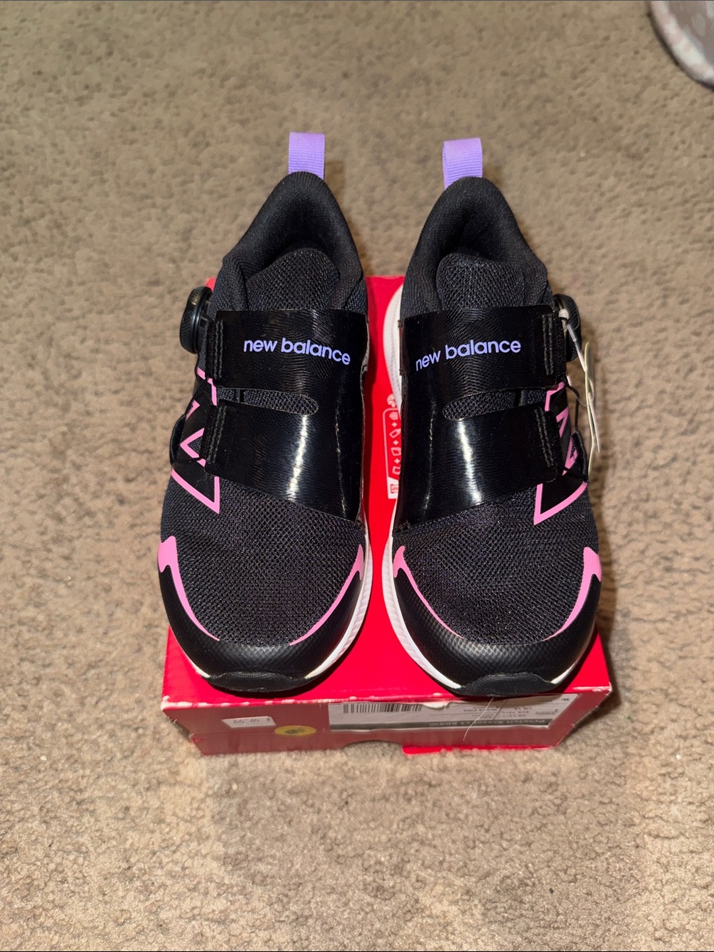 New Balance Kids Black Sneakers with Pink Accents